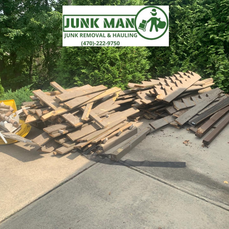 Junk Man Junk Removal and Hauling servicing a client's construction debris removal The best junk removal services in the Metro Atlanta area